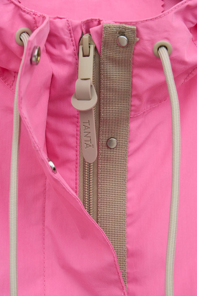 Chaqueta en algodón impermeable de mujer corta Dhuda. Transpirable. Tantä. Color rosa. 