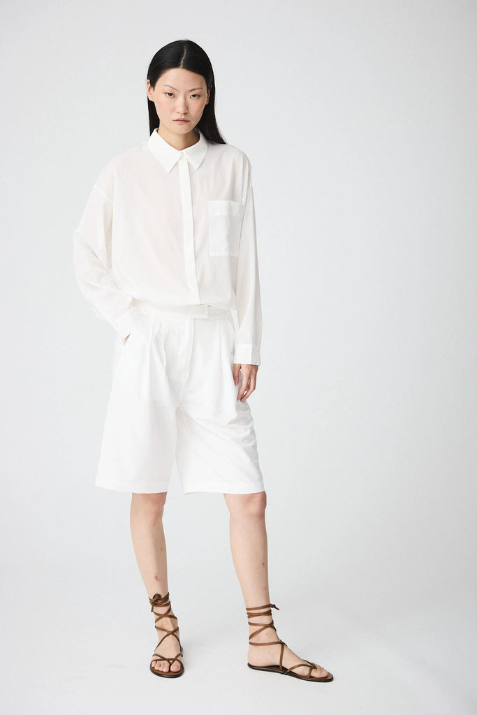 Camisa Mujer Tantä Hazo confeccionada en tejido ligero de secado rápido. Color Blanco 
