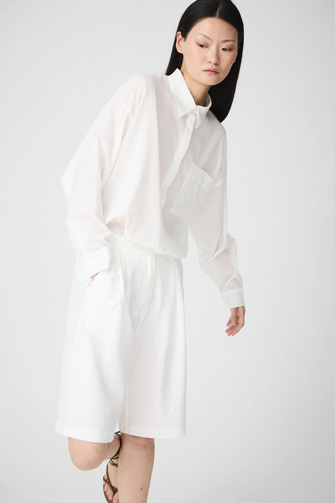 Camisa Mujer Tantä Hazo confeccionada en tejido ligero de secado rápido. Color Blanco 