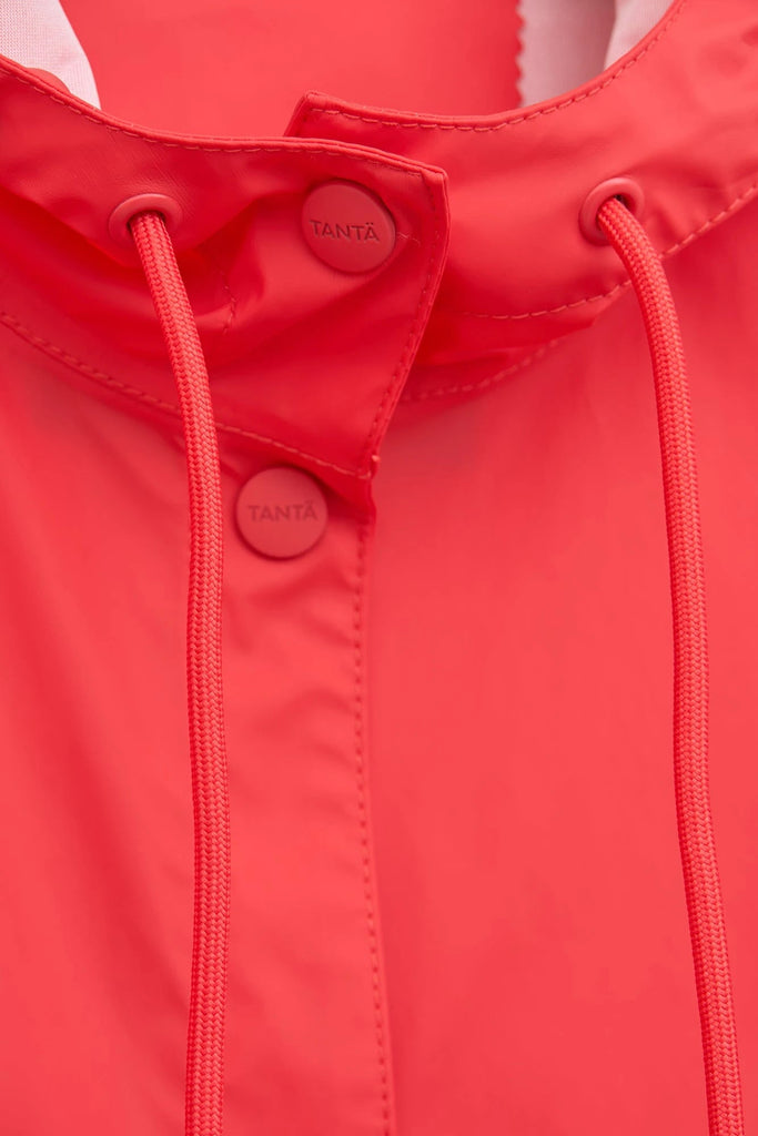 Chaqueta impermeable de Mujer Mis es un chubasquero de corte holgado. Color Rojo