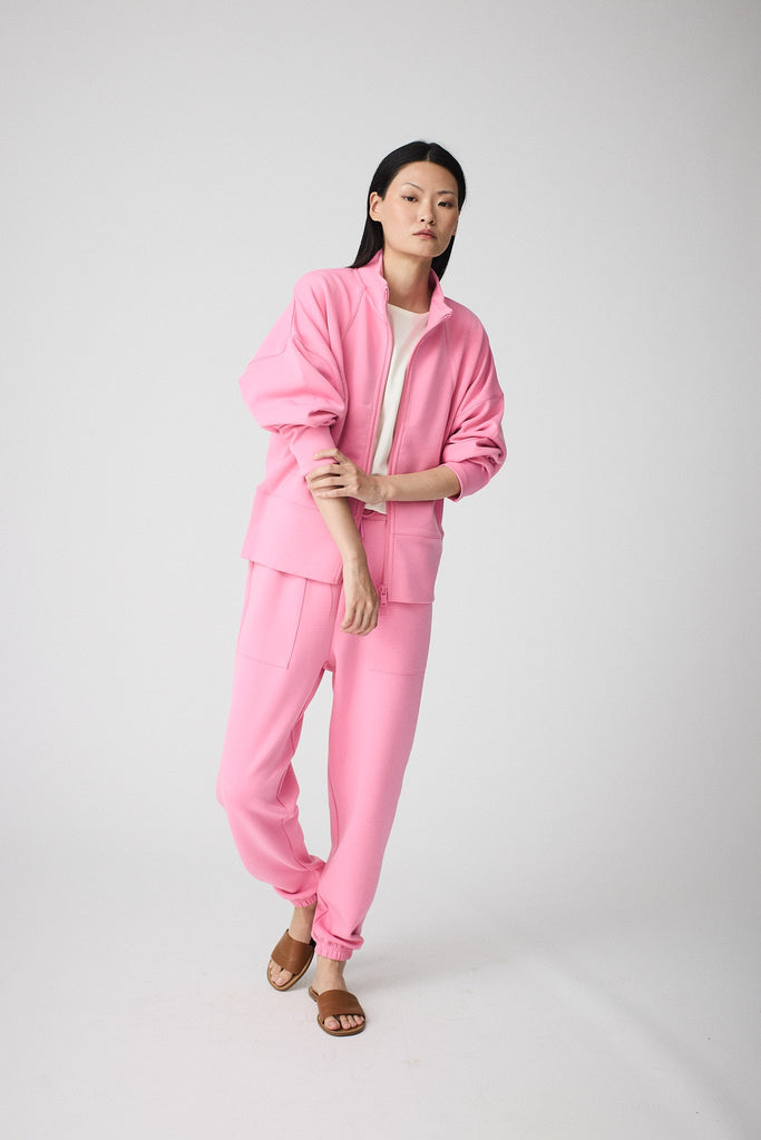 Sudadera de Mujer Tantä con cremallera en tejido interlock secado rápido. Color Rosa 