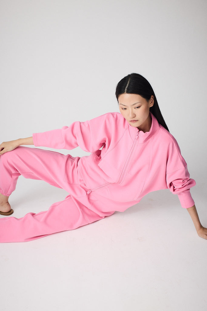 Sudadera de Mujer Tantä con cremallera en tejido interlock secado rápido. Color Rosa 