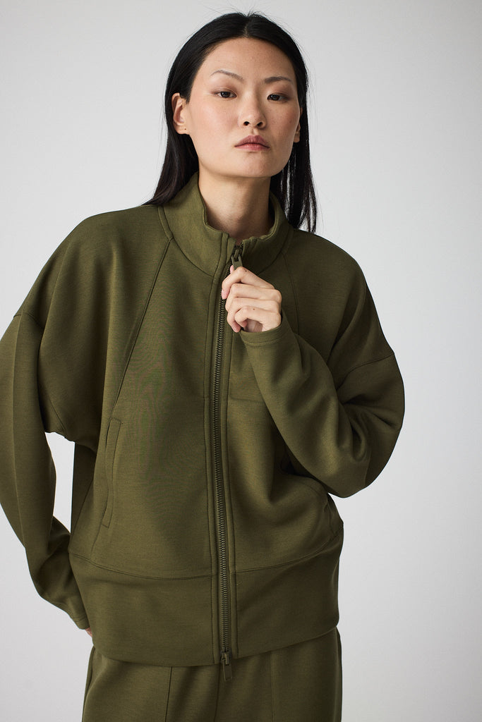 Sudadera de Mujer Tantä con cremallera en tejido interlock. Color Verde 