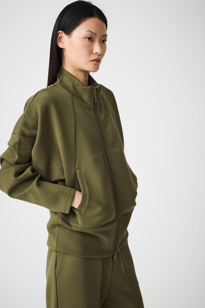 Sudadera de Mujer Tantä con cremallera en tejido interlock. Color Verde 