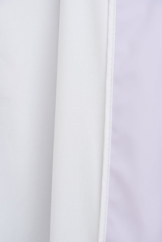 Chubasquero impermeable de mujer Nuovola de Tantä. Color lila