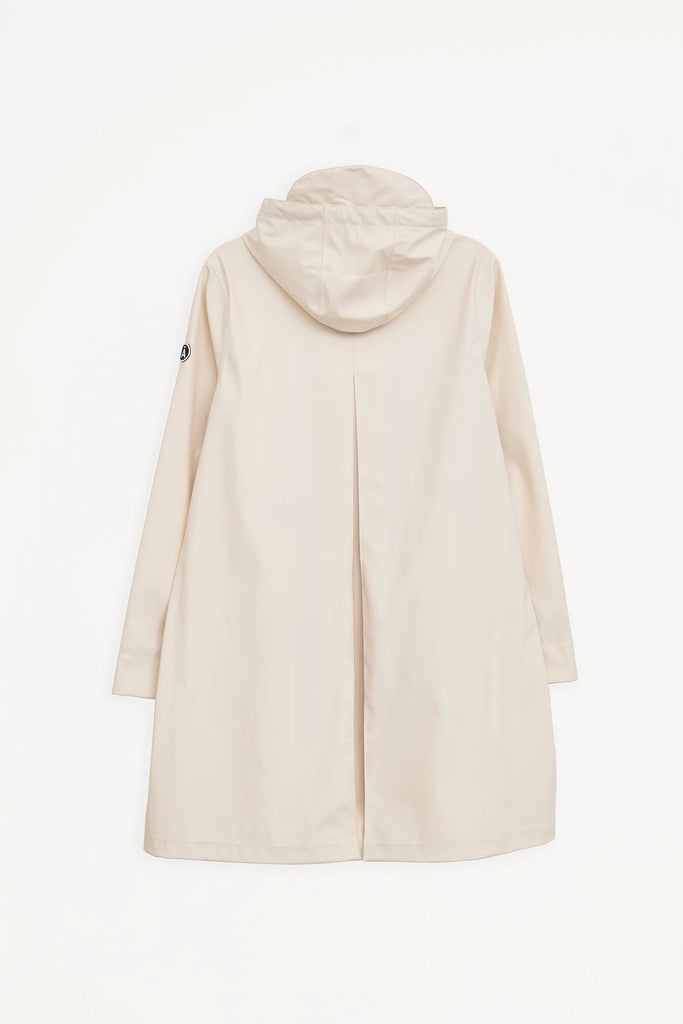 Chubasquero o impermeable de mujer Nuovola de Tantä. Color Blanco roto o crudo. 