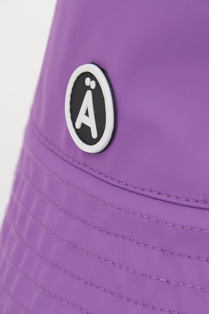Gorro impermeable Drëpsen Tantä lila