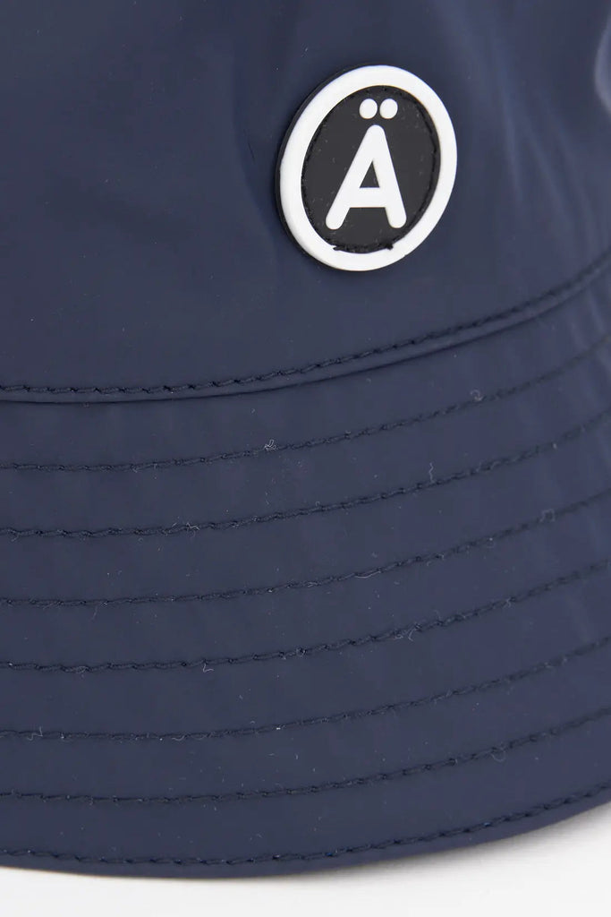 Drëpsen Navy Tantä Rainwear FW23