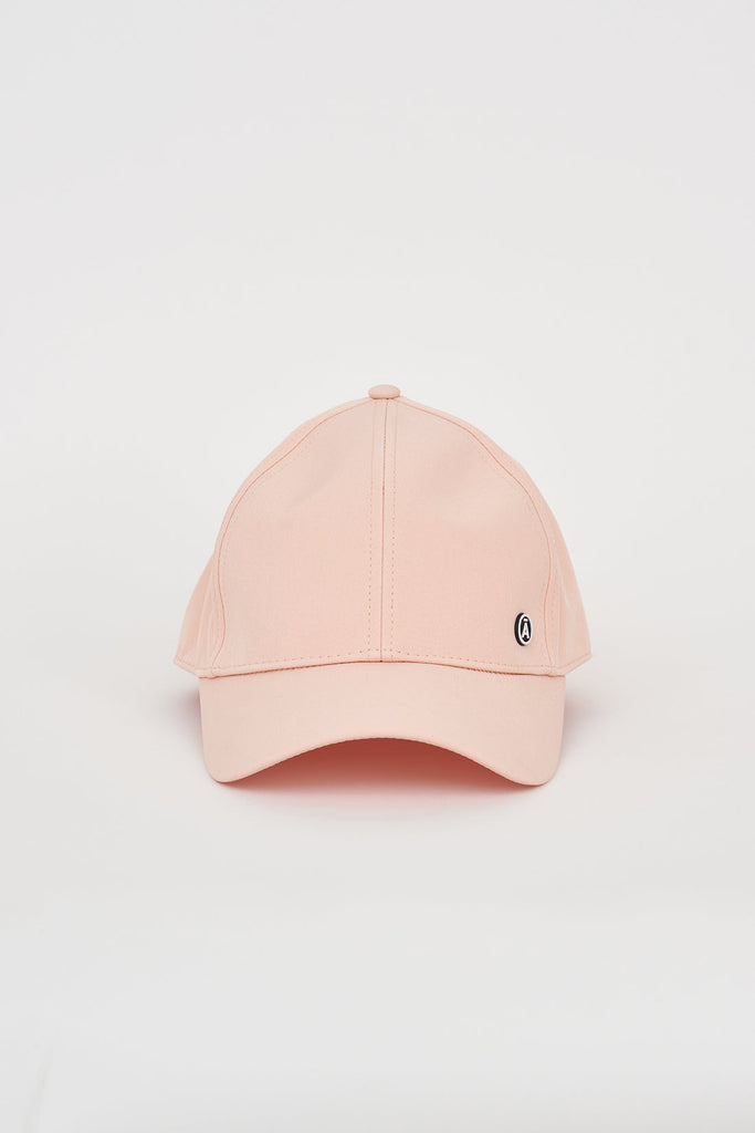 Gorra de béisbol color melocotón confeccionada en softshell ligero Tantä
