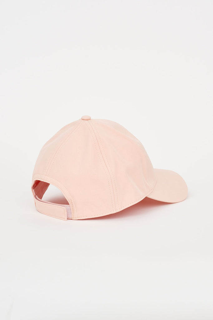 Gorra de béisbol color melocotón confeccionada en softshell ligero Tantä