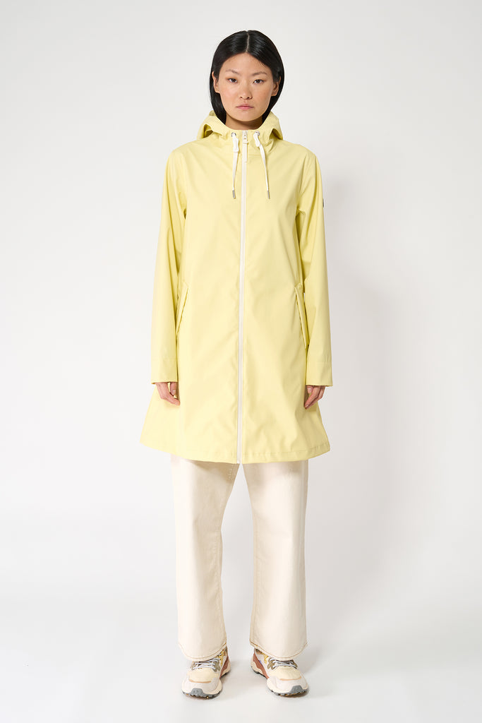 Chubasquero impermeable de mujer Nuovola de Tantä. Color amarillo