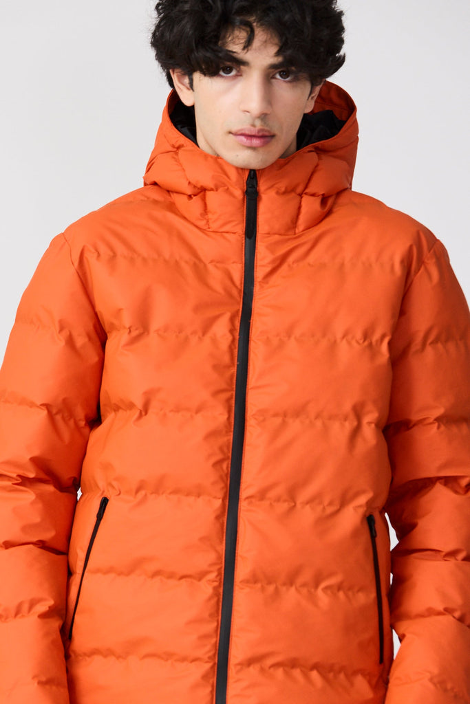 Abrigo impermeable tipo plumas Hombre