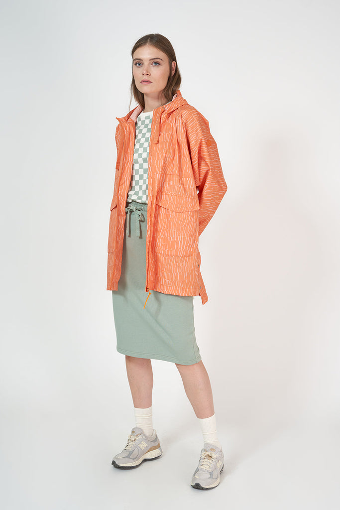 Aguacero - Poncho de Lluvia Rominjati Reciclado Estampado color naranja