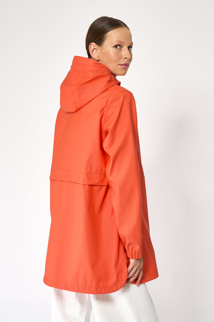 Chaqueta impermeable Brouillard de Mujer Tantä. Color Naranja