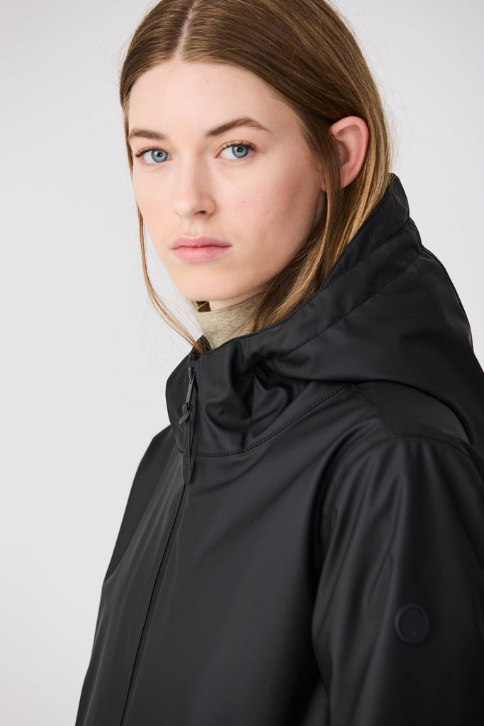 Abrigo Tormenta.100% impermeable Mujer