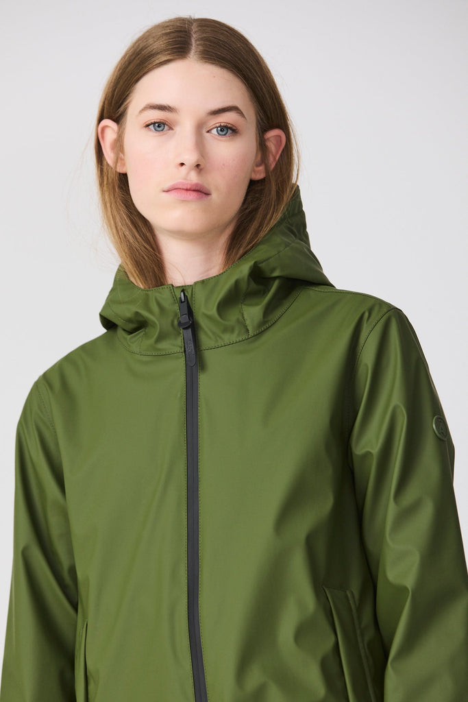 Abrigo Tormenta. Impermeable Mujer verde