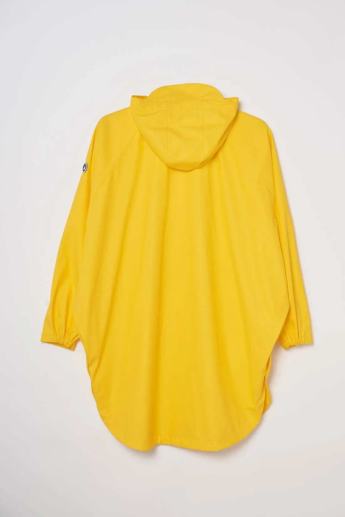 SKY. Chubasquero impermeable tipo capa amarillo unisex Tantä.